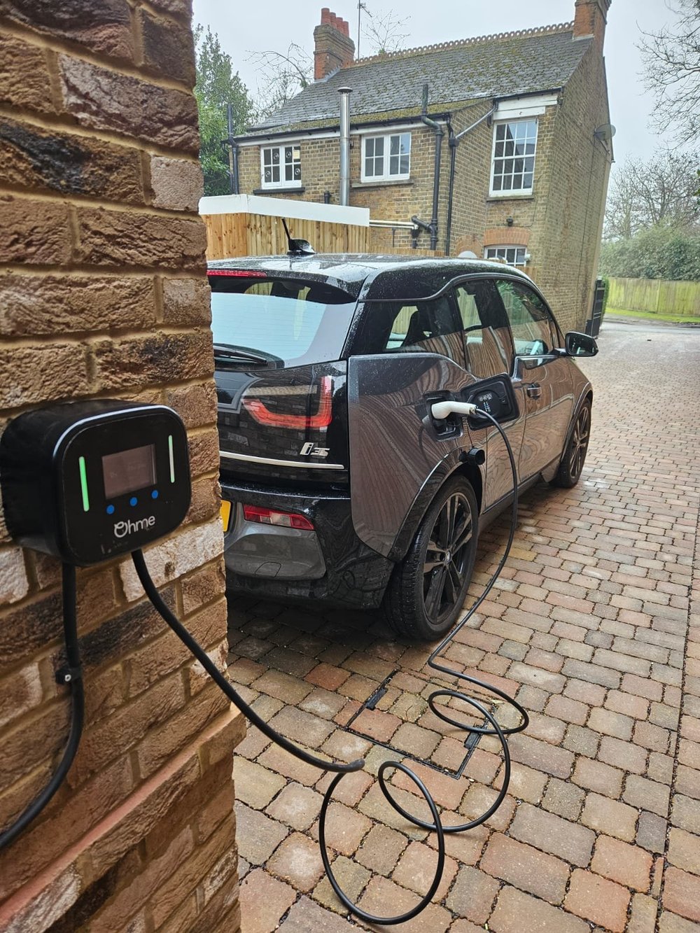 Home EV charger on a driveway